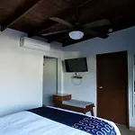 Capital O Hotel América
